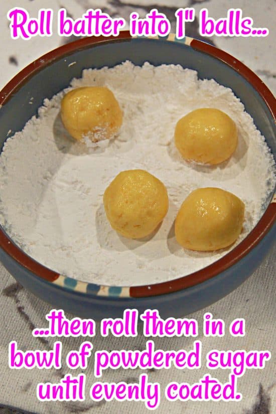 Lemon Crackle Cookies are rolled in powdered sugar for a crackly appearance.