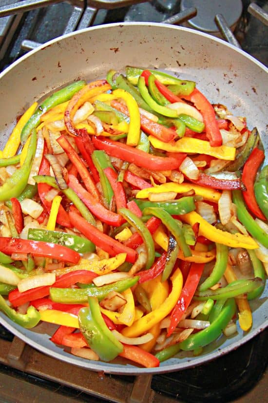 Chicken Fajitas are loaded with classic flavors of bell peppers and onion along with a cheesy cream sauce.