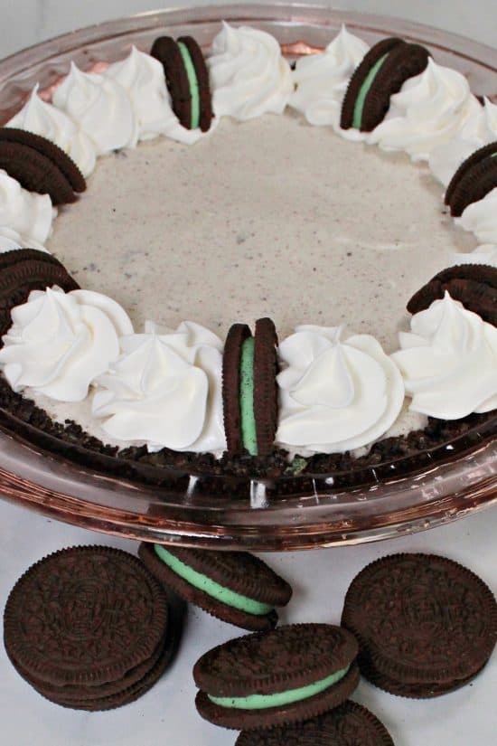 Grasshopper Ice Cream Pie uses mint chocolate chip ice cream with minty Oreo cookies for a delicious treat.