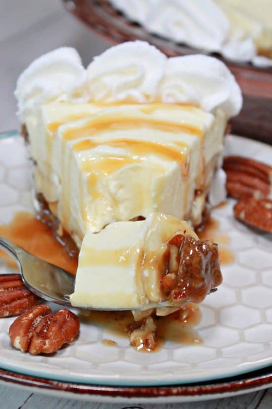 A chilled, delicious dessert with creamy smooth filling over sliced bananas and a caramel/pecan layer.