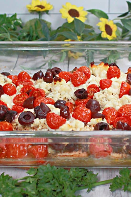 A simple meal oven baked with moist chicken, Kalamata olives, feta cheese, and delicious spices.