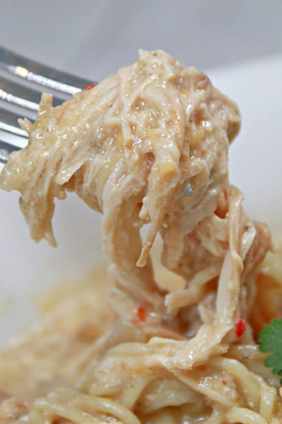 Creamy Enchilada Chicken is made with green enchilada sauce, cream cheese, and simple seasonings.