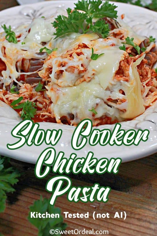 Slow Cooker Chicken Pasta is an easy dinner with tender chicken, melted cheese, marinara, and pasta, of course.
